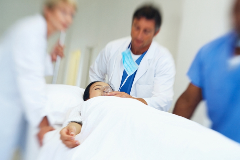 Emergency – Paramedic rushing with a patient on stretcher
